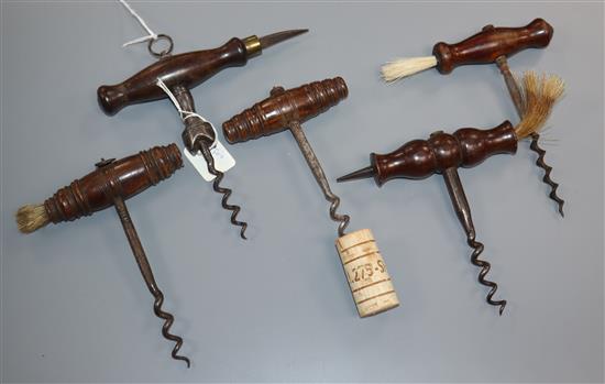 Five 19th century steel and rosewood handled corkscrews,